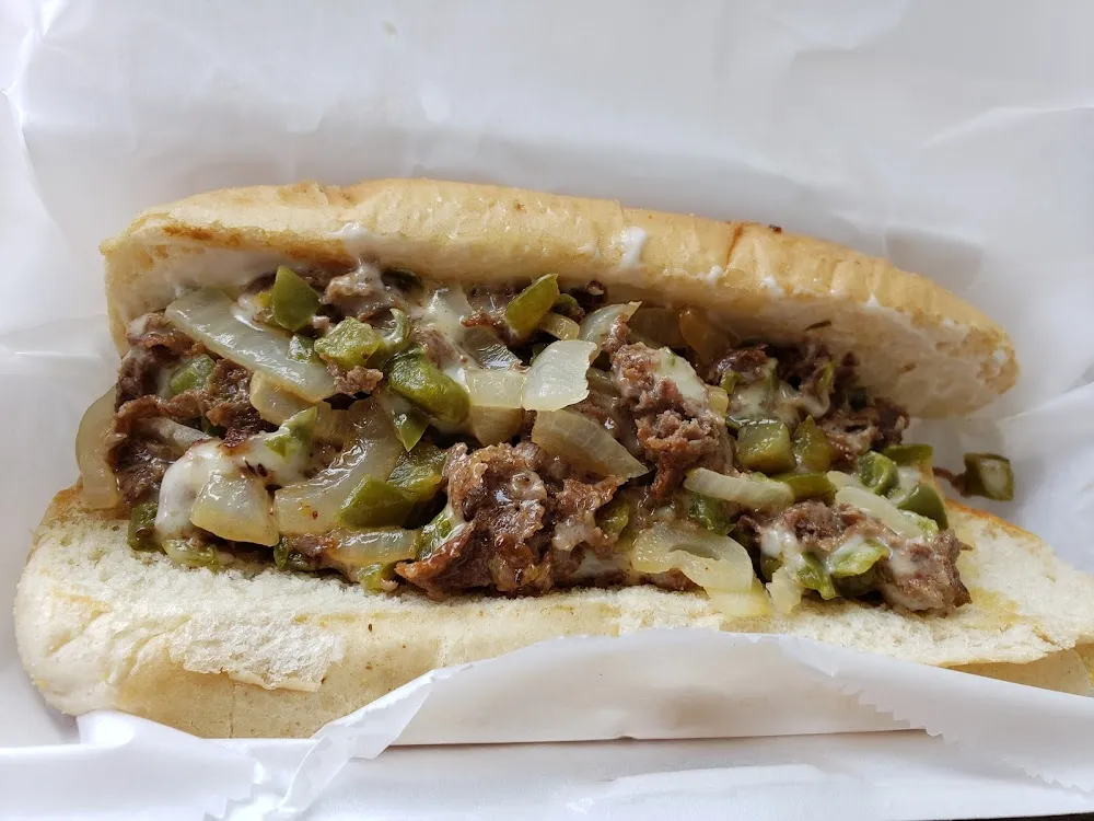 Philly Cheesesteak on Sub Roll with Mayo Bell Peppers Onions Swiss & Provolone Cheeses